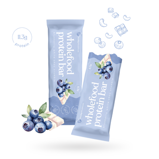 Nutrient-dense Blueberry White Choc Crumble Protein Bar from Sneaky Wholefoods, ideal for a mid-morning boost or as a wholesome treat to support sustained wellbeing.