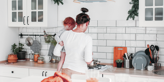 mum and toddler making breakfast together