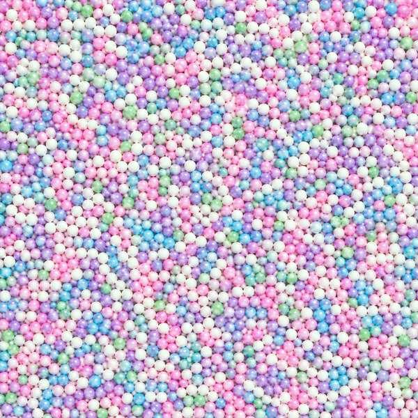 A dense, close-up view of many small pastel 100s and 1000s in pink, blue, purple, green, and white, filling the entire frame.
