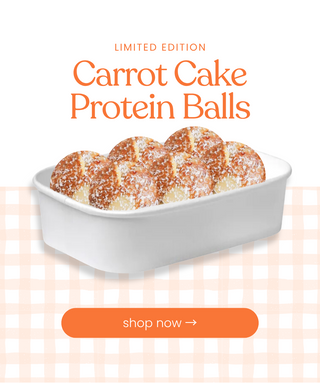 Carrot cake protein balls in a white dish with 'shop now' button on a checkered background