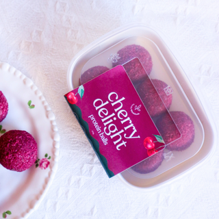 Packaged cherry delight product on a white surface