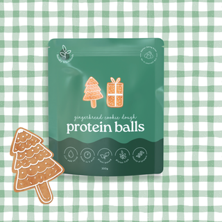 Protein ball package with gingerbread theme on a green and white checkered background