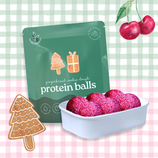 Protein balls in a white container with a green package labeled 'gingerbread cookie dough protein balls' on a checkered background.