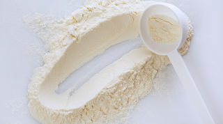 A scoop of pea protein used in sneaky wholefoods snack range 