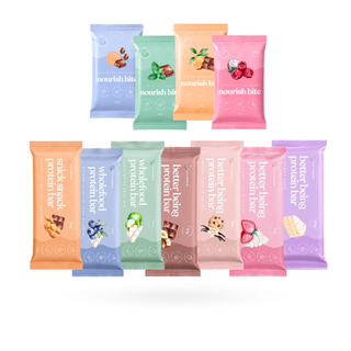 A set of colorful protein bars in individual wrappers, arranged in two rows on a plain white background. The wrappers feature different flavor illustrations and text such as 'nourish bite' and 'better being protein bar'.