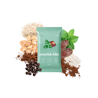 A mint green pouch labeled 'nourish bite' surrounded by ingredients including cashews, cocoa powder, chocolate chips, dates, and mint leaves on a white background.