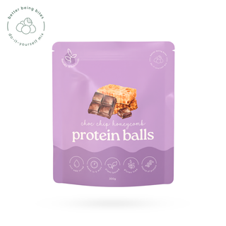 A purple stand-up pouch of protein balls with a chocolate and honeycomb illustration on the front, labeled 'choc chip honeycomb protein balls'. The pouch is centered on a white background with a small circular 'better being bites' logo in the top-left corner.