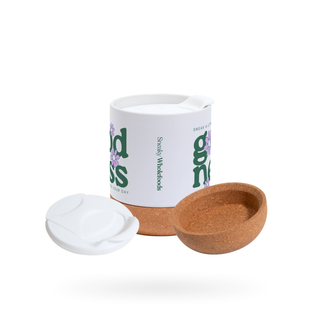 mug with a white lid, cork base, and branded mug on a white background.