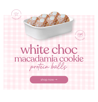 White chocolate macadamia cookie protein balls in a bowl with a pink checkered background and 'shop now' button.