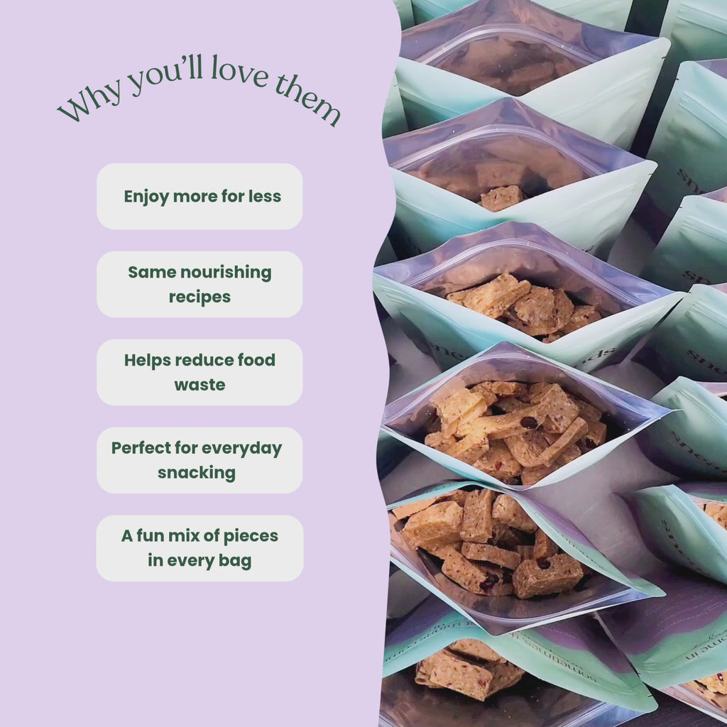 Video showcasing Sneaky Seconds mixed snack bags featuring imperfect protein bars, nourish bites, and protein ball pieces. On-screen text highlights the benefits: enjoy more for less, same delicious quality, help reduce food waste, perfect for everyday snacking, and a surprise in every bag.