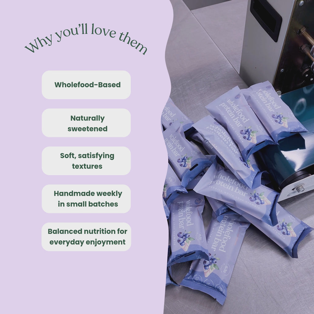 Video showcasing Sneaky Wholefoods protein bars and nourish bites in a production setting, switching between different flavours while highlighting key features including wholefood-based ingredients, naturally sweetened, soft satisfying textures, handmade weekly in small batches, and balanced nutrition for everyday enjoyment.