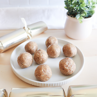  finished Sneaky Wholefoods Gingerbread Cookie Dough Protein Balls, showcasing high-protein, plant-based Christmas treats, perfect for adding a festive touch to your holiday celebrations.